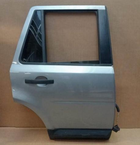 PORTA POST. DX GRIGIO MEDIO MET. (No Alz. - Si Scendente) C/SERR 999-U1294607 Carrozzeria  Lamierati esterni  Porte  Porta post. dx. LAND ROVER - FREE