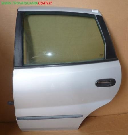 PORTA POST.S. ARGENTO NISSAN ALMERA Tino (V10M)  Carrozzeria  Lamierati esterni  Porte  Porta post. sx. NISSAN - ALMERA Tino - 01-07-2000 - 01-10-2006