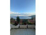 Quadrilocale con terrazzo vista mare, box auto e piscina