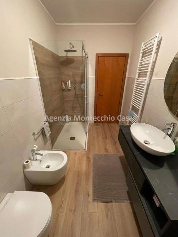 Appartamento con mansarda, garage e giardino esclusivo. - Foto 11