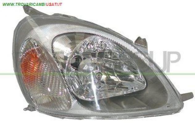 PROIETTORE DESTRO H4-ELETTRICO-CON MOTORE-VERSIONE ICHIKOH TY3204823 Parti elettriche Fanaleria Proiettori Proiettore ant. TOYOTA - YARIS - 1999 2