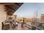 Appartamento con terrazzo e cantina in affitto