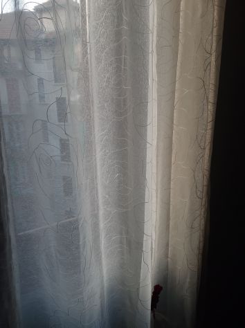 Tende bianche ad anelli