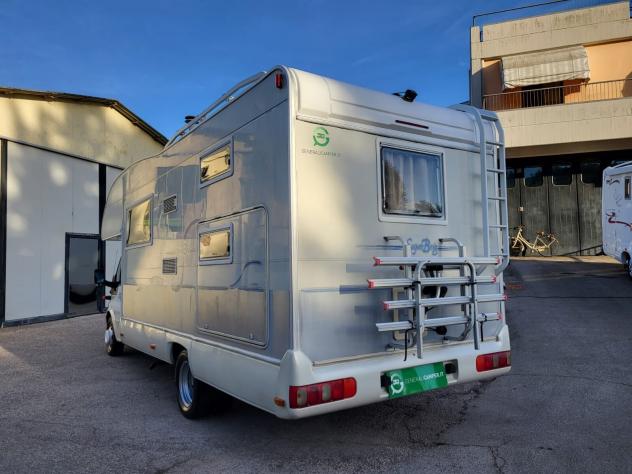 CAMPER RIMOR FORD MANSARDATO 7 POSTI DOPPIA DINETTE LETTI CASTELLO CLIMATIZZATORE TENDALINO GENERALI USATI - Foto 3