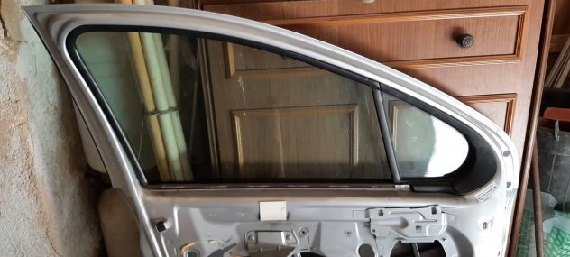 Alzavetro e vetro Peugeot 207