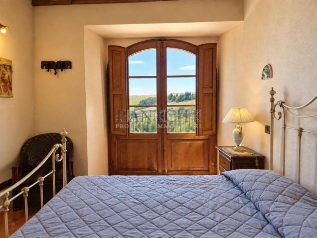 Appartamento rustico con terrazza panoramica e piscina comune - Foto 15