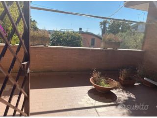VITINIA TRILOCALE ARREDATO CON GIARDINO PRIVATO