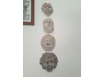 Maschere allegoriche in terracotta