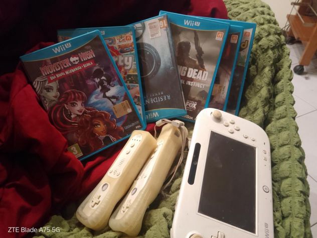 offro console Wii con joystick e 7giochi originali