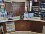 Arredo farmacia con banco 7 scaffalature e mobile angolare