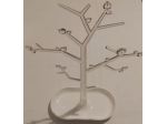 Albero portagioie KOZIOL base bianca svuota tasche e fusto trasparente