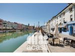"PALAZZO PORTO CANALE", LOCALE COMMERCIALE IN VENDITA