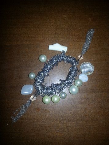 UN BRACCIALETTO NUOVO MA VINTAGE MAI USATO DA RAGAZZA/DONNA ELASTICIZZATO CON PE - Foto 3