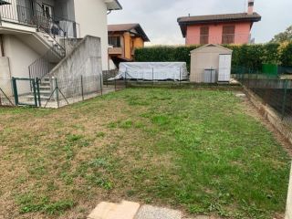 trilocale con box e giardino