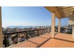 Attico con terrazza perimetrale e vista mare