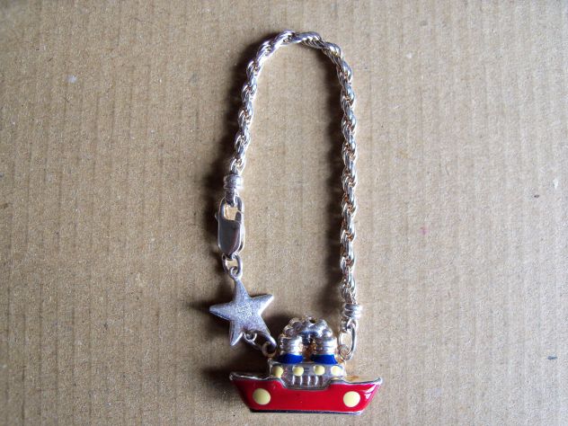 Braccialetti e porta chiavi in argento. - Foto 5