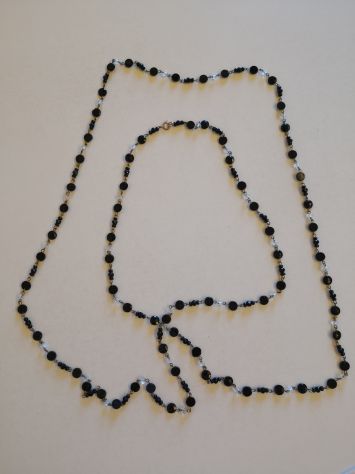 Collana inserti neri, trasparenti, bigiotteria, lungh. m. 2, fermaglio metallo