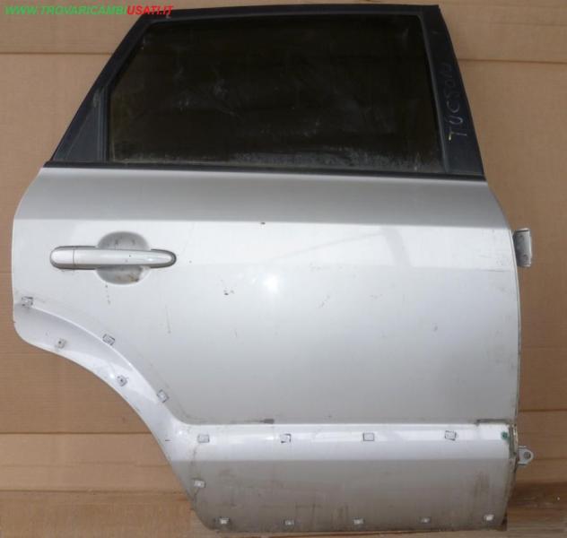 PORTA POST.D. ARGENTO C/ALZ. E SERR. Carrozzeria Lamierati esterni Porte Porta post. dx. HYUNDAI - TUCSON - 01-07-2004 - 01-10-2010