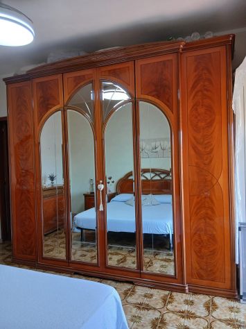 Splendida camera da letto in legno