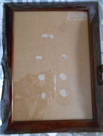Cornice in legno laccato