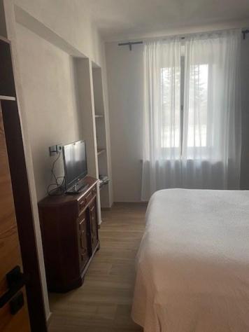 OULX BELLISSIMO BILOCALE " IGINO " CON POSTO AUTO E GIARDINO PIANO TERRA - Foto 11