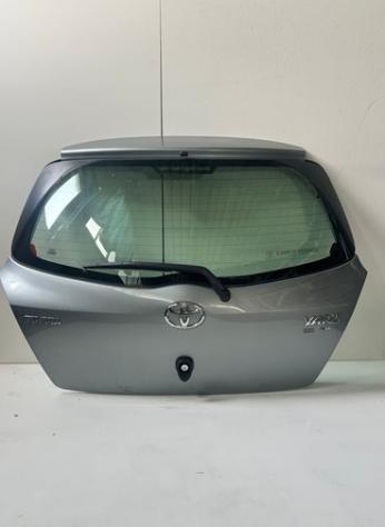 PORTELLO POST. GRIGIO MEDIO MET. C/MOT. 999-U1307282 Carrozzeria Lamierati esterni Portello Portello post. TOYOTA - YARIS - 01-01-2006 - 01-01-2009