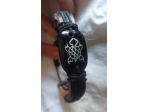 bracciale artigianale in cuoio nero design tartaruga