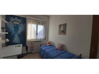 Stanza in appartamento in affitto a Melzo