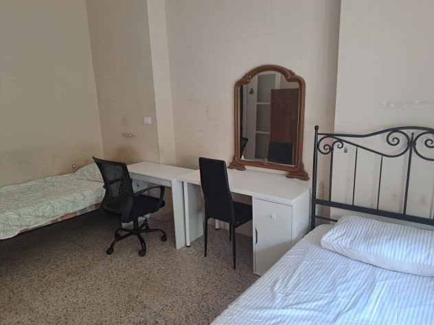 letto singolo in camera doppia