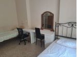 letto singolo in camera doppia