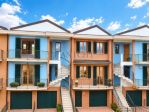 Appartamento di nuova costruzione con balconi, garage e giardino privato