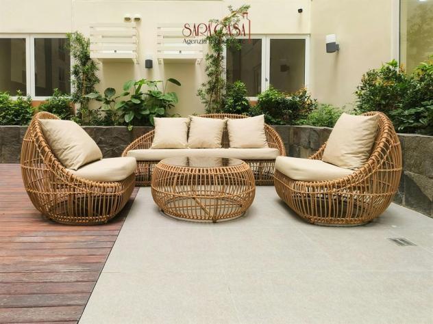 Appartamento con tre camere da letto e giardino esclusivo