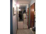 Armadio IKEA PAX a 2 ante con cassetti e spacchiera.