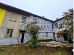 PORZIONE DI CASCINA CON AMPIO GIARDINO PRIVATO