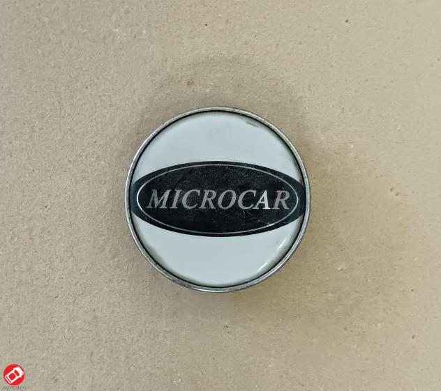 1000645 LOGO COPRICERCHIO MICROCAR MC1 2 VIRGO I II III