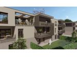 Appartamento con ampio giardino, garage e posto auto