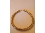 Collana girocollo in metallo flessibile, color oro, a scaglie di pesce anni '70