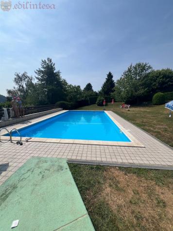 Trilocale con Taverna in residence con piscina