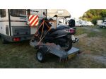 Carrello targato Trasporto Attrezzature Turistiche e sportive , moto