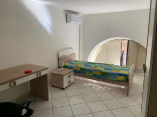 Stanza in appartamento in affitto a Catania