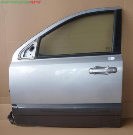 PORTA ANT.S. ARGENTO C/ALZ. E SERR. 2 picc. b.ll  Carrozzeria  Lamierati esterni  Porte  Porta ant. sx. KIA - SORENTO - 01-08-2002 - 01-04-2006