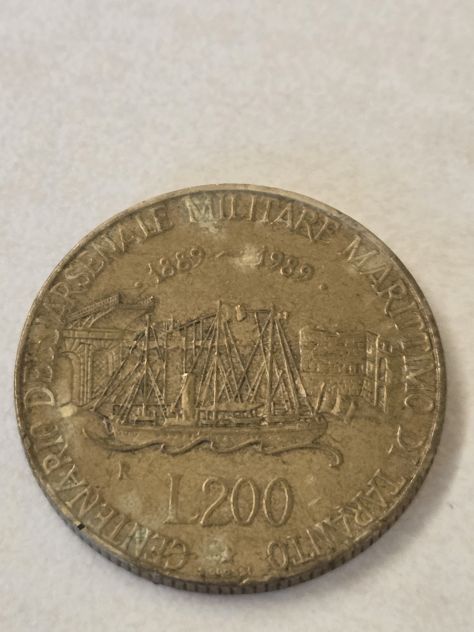 Numismatica, moneta da 200 lire della repubblica it., del 1989 per 100° A.M.T.