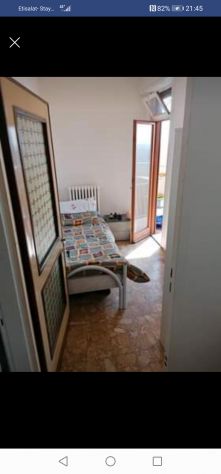 Stanza singola con balcone
