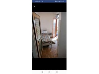 Stanza singola con balcone