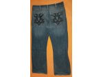 Jeans Calvin Klein da uomo in denim con un ricamo tribale.