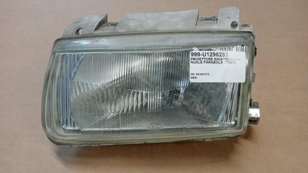 PROIETTORE SINISTRO H4 MANUALE PARABOLA RIGATA - HELLA 999-U1296293 Parti elettriche  Fanaleria  Proiettori  Proiettore ant. VOLKSWAGEN - POLO - 01-09