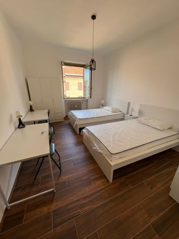 Trilocale ristrutturato con balcone e posto auto - Foto 9