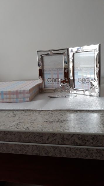 Cornice doppia in argento