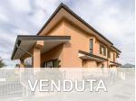 Porzione di bifamiliare con giardino e terrazzo a Dolzago