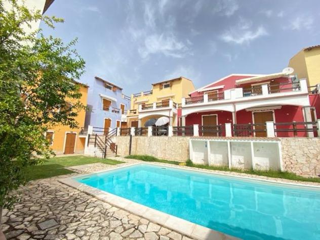Trilocale Ristrutturato al Piano Terra con Giardino e Piscina
